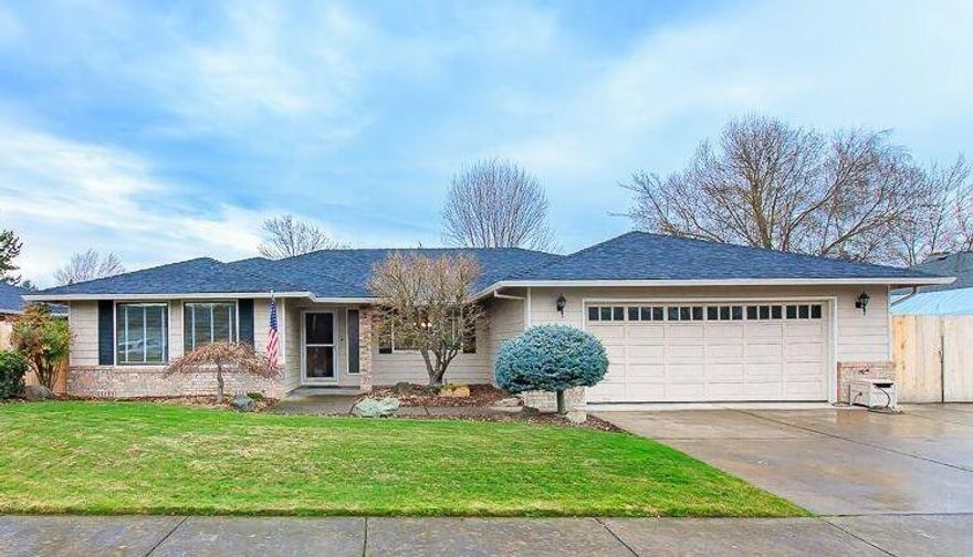 Beautifully updated & remodeled East Medford home. Spacious & open living, dining & kitchen areas. Large island kitchen is completely remodeled with granite counter tops, new cabinets with pullouts, newer appliances. Inviting family room with gas fireplace. Double vanities in both bathrooms, skylight in hall bath. Formal living room with French doors, could easily be an office or fourth bedroom. Large master bedroom with walk in closet & sliding doors to the back yard and and detached 96 sq ft craftroom/shed/office with electricity. Very nice dog bath in the garage. Decorative pond in the fenced back yard. Small RV parking for boat or utility trailer. Attached two car garage with opener. This home is a must see!!!