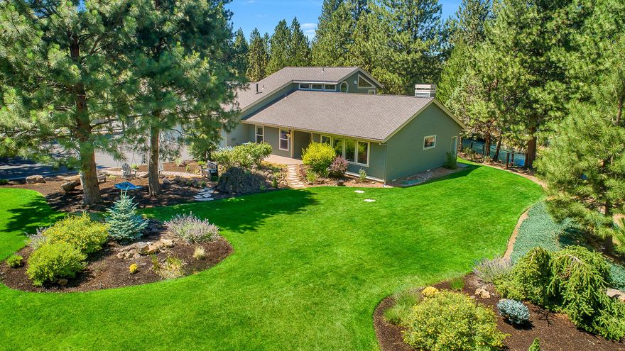 Beautiful, updated home nestled in a park like setting at the end of cul-de-sac! Situated on a spectacular 3/4 acre backing to a seasonal irrigation canal, this home is a rare find! This unequaled setting offers privacy, serenity, and room to roam while the pristine condition of this home help significantly differentiate this home from the competition. Over $250,000 in upgrades, some of which include all new Milgard windows, window treatments, Hickory wood flooring, tile & carpeting. The kitchen boasts Quartz countertops, Cherry wood cabinets, updated lighting, breakfast bar, stainless steel appliances, Viking Professional cook-top, double oven and wet bar. A 418 sq. ft. Bonus Room above the 4 CAR garage offers the new owner an opportunity for an ADU/micro apartment with private exterior access available (would require a staircase). The beautiful landscaped backyard sits on the edge of an irrigation canal, separating this home from the 12th fairway of the Old Back 9 golf course!