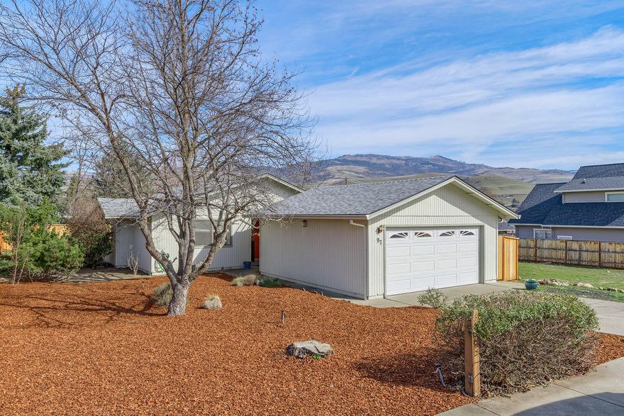 This versatile single-level home is situated in the popular Helman School District. Inviting trellis covered entry, spacious open dining-living room with vaulted ceiling, cozy fireplace and a galley-style kitchen with tile flooring and pantry. The main bedroom has double closets, a full private bath and patio access. The level backyard is completely fenced, has mountain views and a covered patio, perfect for outdoor dining. Attached double-car garage.  The proximity to neighborhood parks & school are sure to win your approval.