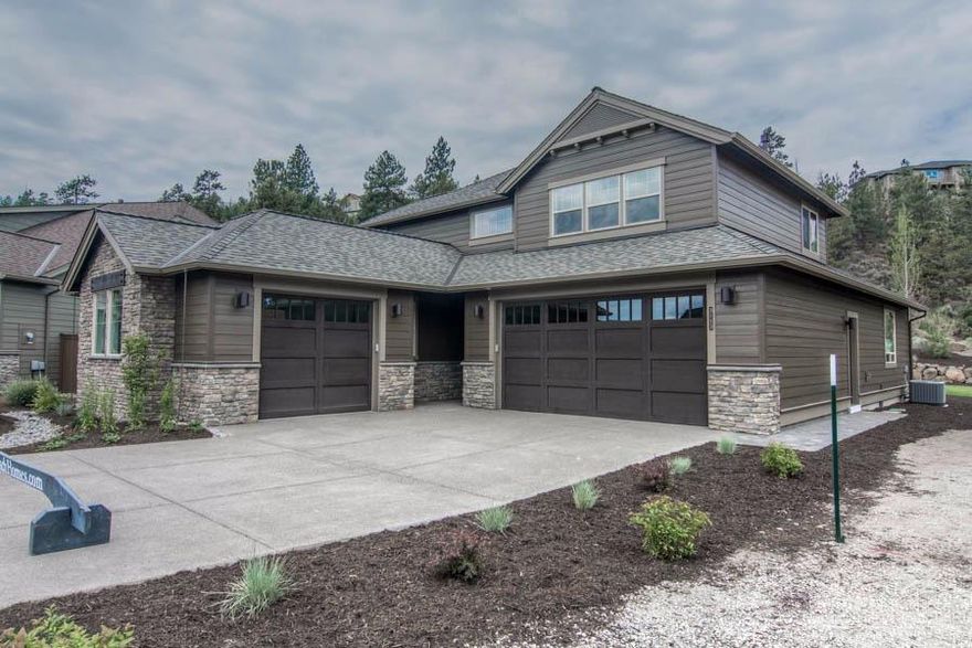 Floorplan: HEMINGWAY 3-P-2746-0. Beautiful Pahlisch Home with stunning views, steps from the golf course and river trail. Pahlisch custom quality finishes throughout include inviting entry into great room, coffered ceiling, large windows providing lots of light, quartz counter tops, SS appliances, engineered hardwoods, walk-in closet, and much more.