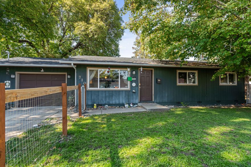 Welcome to this updated 3-bedroom, 1-bath home located near downtown Grants Pass, the Rogue River, and the community skate park. Featuring 1,000 sqft of living space, this home offers recent upgrades including a new roof, fresh exterior paint, LVP flooring, and energy-efficient ductless heating/cooling and dishwasher. Sitting on a generous corner lot, the fully fenced backyard is ideal for pets, gardening, or entertaining.