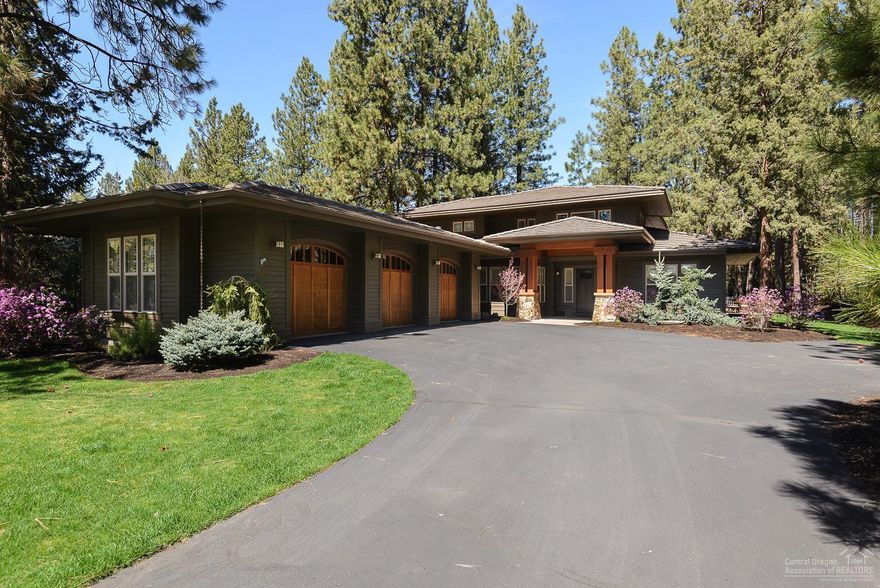 Stunning remodeled home in Broken Top. High end finishes, custom cabinetry and solid surface counter tops throughout. Open floor plan featuring great room with gas fireplace, gourmet kitchen, dining area, guest suite and den on the main level. Master suite on main level with gas fireplace, outdoor access and spa-like bathroom boasting a large tile shower and free standing soaking tub. Two bedrooms, full bath and bonus room on upper level. Wine closet with refrigerator. Laundry room and mud room with custom built-ins. Surround sound inside and out. High efficiency heating and cooling as well as electric radiant floors in master suite bath, guest suite bath, laundry room and mud room. Two covered patios in addition to a large paver patio with gas fire pit and hot tub for outdoor living. Oversized 1,108 sq ft triple-car garage. Beautifully landscaped and private yard.