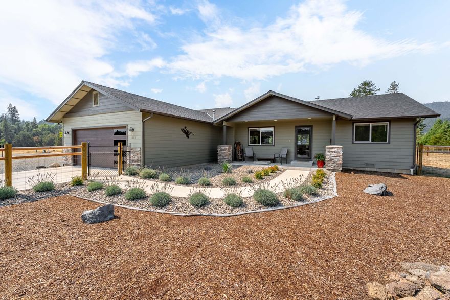 Discover this 2023-built gem tucked inside a gated community. Sellers have thoughtfully added upgrades, enhancing the already impressive design. The kitchen showcases quartz countertops, custom cabinetry, a spacious island with bar seating and a walk-in pantry. The kitchen is perfect for entertaining or preparing everyday meals with ease. The vaulted ceilings create an airy and open feel. The primary suite offers a large bathroom with double sinks and a walk-in closet. Generously sized bedrooms, a well-designed laundry room, and quality finishes throughout make this home both comfortable and elegant.
The low-maintenance yard sits on .78 of an acre, complete with a two-car garage, 12x16 storage shed, RV parking, and full fencing for privacy. Best of all, enjoy deeded access to the scenic Illinois River, making this property truly special.