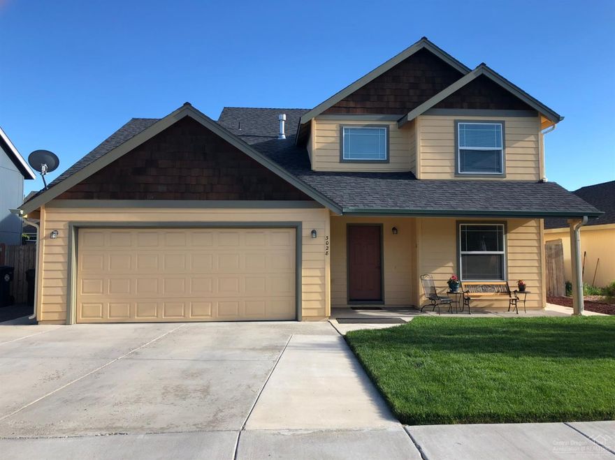 4 bed 2.5 bath 2 story home with master on the main level. Open floor plan. 3 large additional bedrooms, full bath and bonus area on second level. Beautiful home close to schools and all that Redmond has to offer. Low maintenance landscaping compliments the large rear patio perfect for entertaining. Fully fenced. Move in ready!