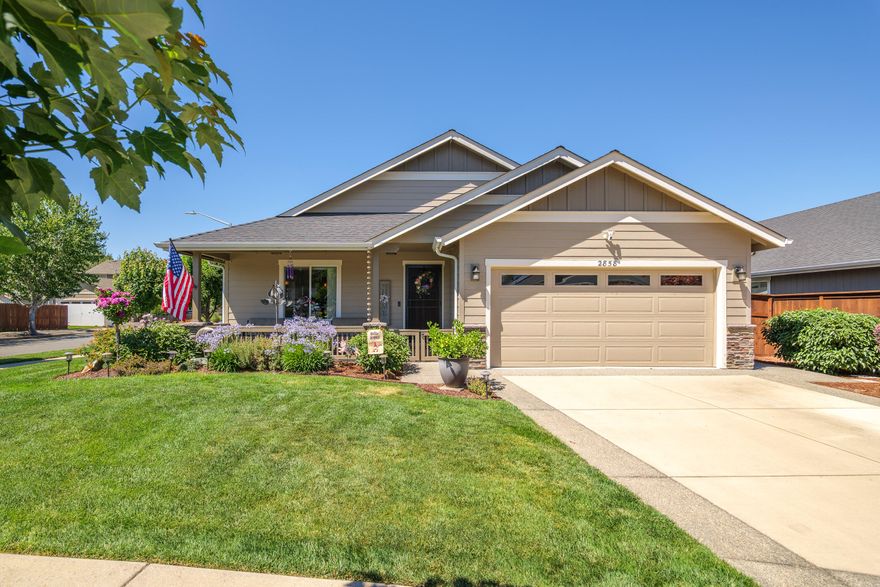 Welcome Home! Immaculate & move-in ready, this bright & airy home built in 2015 features a comfortable 1507sf, 3 bed, 2 bath floorplan perfect for anyone! Welcoming covered front patio leads to a spacious living room featuring vaulted ceilings & a wonderful kitchen accented by eating bar, granite counters, large pantry, stainless steel appliances & dining area. Just off the kitchen is a door leading to a covered back patio w/ ceiling fans perfect for relaxing on those warm summer evenings! Low maintenance yard features in-ground sprinklers & drip system, plus 2 storage sheds & garden area! Inside, the 3 large bedrooms includes a spacious primary complete w/ a large walk-in closet & private ensuite bath w/ double-sinks & walk-in tile shower! Additional features include a laundry room w/ storage cabinets, hardwood flooring throughout, plus a 2 car garage w/ storage options. All conveniently located just minutes from D-7 schools, parks, shopping & more! Call today to make this your home!