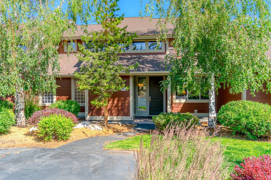 Gorgeous townhome in Creekside Village @ the Ridge at Eagle Crest. Luxury finishes, floor to ceiling windows & tons of natural light in this Great Room plan w/vaulted ceilings. Classic slate tile entry, carpeted main living area w/slate adorned fireplace w/built-in entertainment center. Kitchen ftrs granite counters, plenty of cabinetry & breakfast bar seating. Kitchen is open to dining area w/views out to the patio & beyond. Main level Primary bedroom has desirable separation w/sliding doors out to the patio. Tiled primary bath w/dual vanity, corner soaking tub, step in shower & laundry ensuite. 2 addtnl bedrooms upstairs share a full bath & loft area/office space. Outdoor paver patio offers plenty of room for entertaining & enjoying your morning coffee; storage areas off patio & front entry. All appliances included. Enjoy golf, tennis, pickleball, swimming & miles of trails for hiking & bicycling. Don't miss this one, ideal for full time residence, vacation home or short term rental!