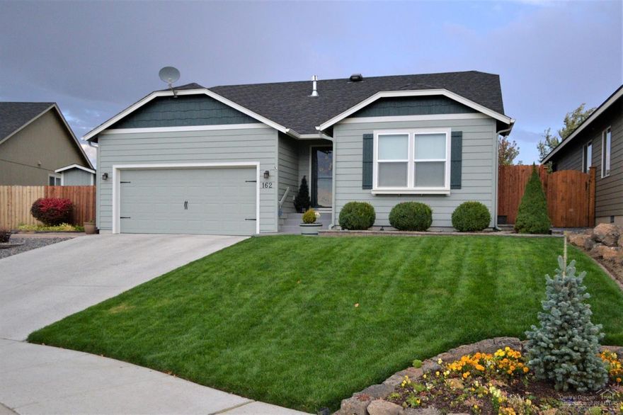 Immaculate single level home in SW Redmond! Meticulously maintained, this one owner home is warm and inviting. Featuring 3 beds and 2 baths. One bedroom has glass french doors and could be used as office. The master suite has vaulted ceiling, 2 walk-in closets and a double vanity. Open great room with gas fireplace and spacious dining area. Stainless appliances in kitchen with large pantry and island/breakfast bar. Natural gas forced air/AC. Double car attached garage. Very private backyard with paver patio for entertaining, beautiful terraced garden area, 4X8 storage shed, RV parking accessed from alley and gorgeous mountain views!