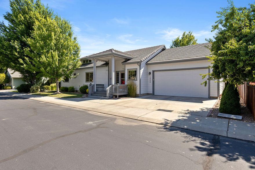 Introducing this charming single level in The Cliffs gated community (No age restriction) with a RARE fully fenced backyard, perfect for your furry friend to roam freely and safely. 3 bed 2 bath with extra storage throughout and a tandem garage space.  Inside, enjoy the warmth of a custom stone surround gas fireplace & updated kitchen with modern amenities. Single level ADA compliant hallways and doorways. Tons of natural light, complementing the refreshed flooring throughout the kitchen, hallway and dining areas.  Large walk in pantry in the kitchen gives ample storage. Outside, a 50+ year concrete fireproof roof ensures durability, while a spacious deck and pergola with misters provides an ideal spot for summer relaxation and outdoor entertaining. Along with a nicely sized landscaped grass area around the back of the home.  The HOA does both front and back landscaping, and includes water use, ensuring a well-maintained exterior. Located in a secure and exclusive community!