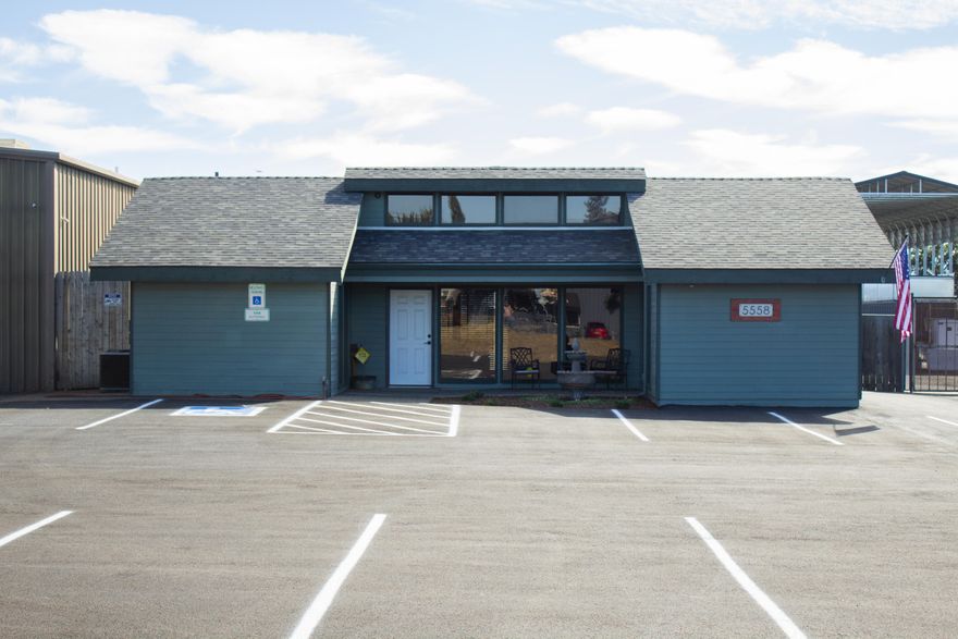 This Warehouse with office space is ready for your Business and move in ready! Zoned light Industrial. Have a hemp business? Maybe cabinetry? This location and warehouse could be used for vault storage or shipping and receiving, the options are here. Recent updates include a 3 phase electrical panel, bathrooms, office space, LED lighting and HVAC, heat detectors and an alarm system to both warehouse and office space. Also , It's all ADA compliant.  The warehouse offers 10,800 sq. ft. with roll up bay doors, ceilings 15+ feet tall along with separate office space and rooms of about 900 sq. ft. This property is fully fenced with city sewer and a well. City water is available. The surveillance system runs a total of 20 cameras inside and out. New paved parking lot in 2021! Call today to set your appointment, easy to see.