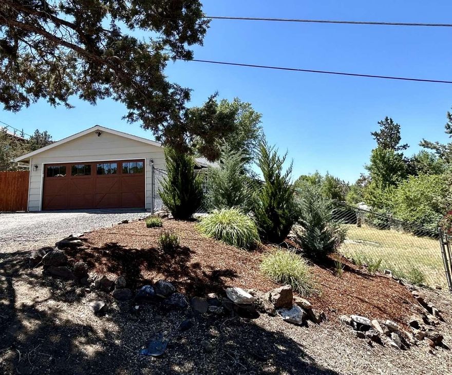 Enjoy breathtaking Cascade Mountain views from this fully renovated 3 bedroom, 1 bath home situated on a .23-acre lot in Terrebonne. Just minutes from Smith Rock State Park, this property offers a serene retreat with modern amenities and abundant usable outdoor space. This home features quartz countertops in the kitchen and bathroom, as well as an attached two car garage. Space below the home is ideal for parking an RV or building a shop. It has efficient ductless heating and AC. Luxury vinyl plank flooring throughout. You can commute to anywhere in Central Oregon from this home- it is about a 1/2 mile jaunt to highway 97. New septic tank in 2019. Also, this home boasts easy maintenance, making it an ideal candidate for a vacation rental while also offering the potential to serve as a comfortable family home.