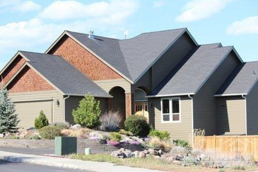 Vast views of Ochoco Mtns and downtown. This beautiful home offers 4 beds, 3 baths, master on the main. 3,841SF. Open floor plan living room w/12' ceilings, formal dining, large family room, wine cellar, bonus room & lots of storage. Recirculating hot water, sliding drawers in kitchen & heated jetted tub. Upper/lower decks. 3 car garage. Addt'l driveway for RV parking. Low maintenance landscaping. 2013-new carpet, interior/exterior paint. Master bath remodel w/new travertine. Ridgeview HS & Sage Elem.