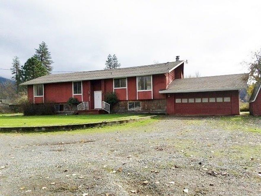 RELISTED! This home requires a K rehab loan! This home is really much larger with the unfinished basement. With beautiful views of TWO year round creeks, Evans Creek and Pleasant Creek, from your deck. All rooms are large with infinite possibilities for the basement...rooms for crafts, office, workout? Whatever your heart desires. With over 2 acres of property, the opportunities are endless.