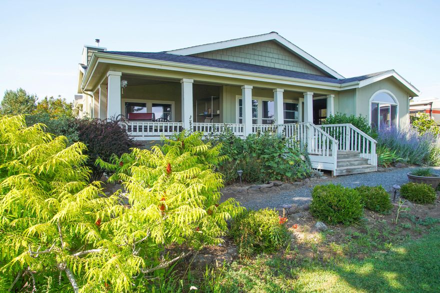 The Rock Bottom Ranch is up for sale. This property is a unique setting as it used to be a working koi farm and nursery. The 3 bedroom 2 bath original farm house has been tastefully updated and there is a second home on the property currently being used as a VRBO with an ave of $20k plus income per year. It is a very good quality Palm Harbor manufactured home with 4 bedrooms and 3 baths along with five 50 amp services for a group of RVer's to come enjoy a weekend on the ranch. Take a peaceful walk through the small vineyard on your way out to the koi pond. Other amenities include  new solar panels that produce 22.8KW DC, a 42x96 clear span structure to store equipment, a second breeding pond for koi, barn and many other outbuildings. All this sits on 5 lots with a total of 204.71 acres with a current irrigation well serving 20.3 acres of water rights. The property does have a second well that is an  artisan well not currently in use at this time.