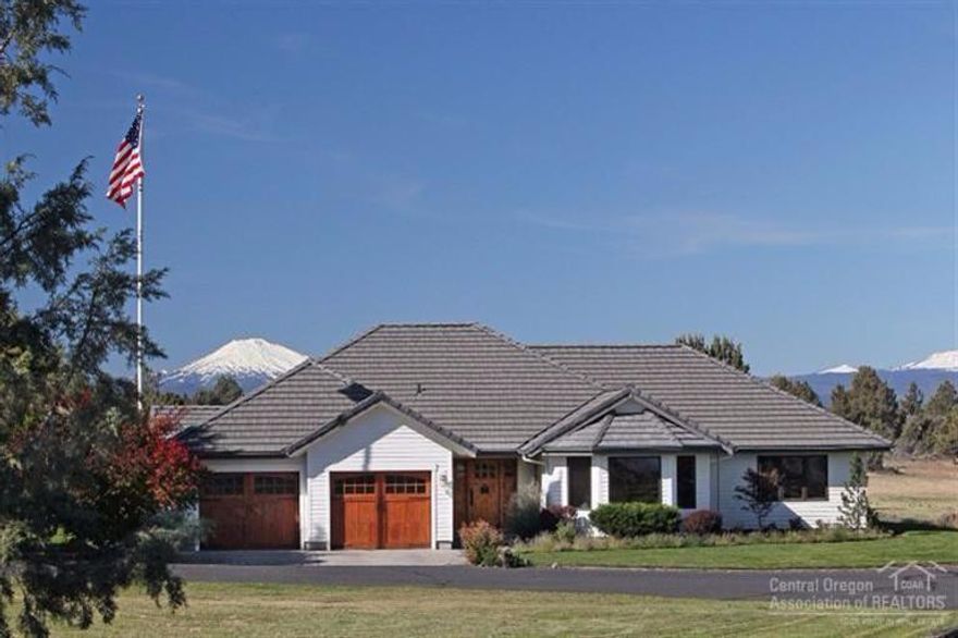 Manicured 19 acre equestrian property w/gorgeous Cascade Mountain views, Mt Hood to Mt Bachelor. Renovation completed in 2013 includes barnwood flooring,knotty alder trim & doors,river rock fireplace,clay plaster walls,bronze hardware & stainless appliances.Carriage house suite adds 1700 sq ft of living space w/office & media room featuring a wood burning fireplace & large Smart 3-D TV. 1,000 heated shop w/ample toy storage. 4-stall stable w/heated tack room & equipment storage. 200X200 outdoor arena.