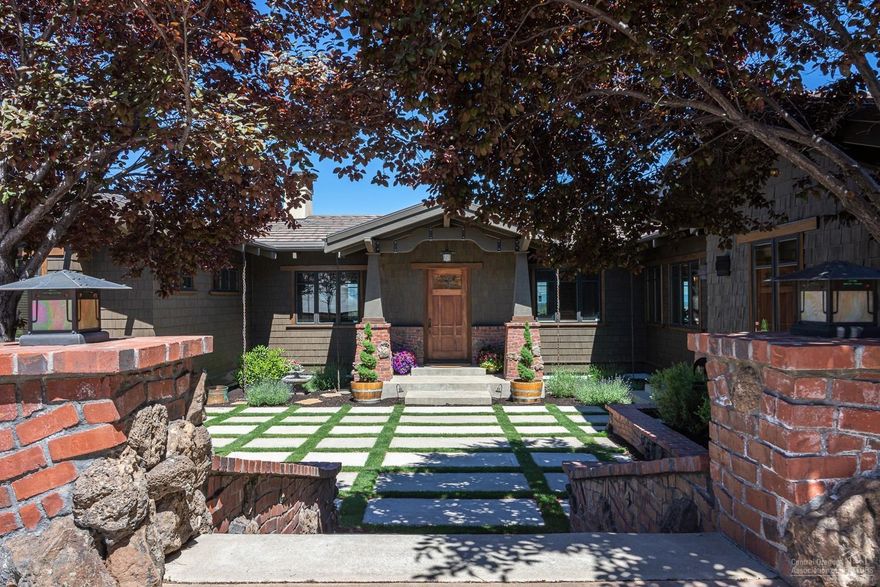 Stunning 10 peak mountain view estate in the gated community of North Rim. Impeccably built Green and Green inspired home with artisan woodwork throughout. The main floor boasts reclaimed wide plank hardwood floors. The thoughtfully laid out 1st floor includes a living room, dining room, gourmet kitchen with a Viking range and refrigerator, soapstone countertops and an 8-foot copper island. Butler's pantry with 2nd dishwasher, refrigerator and built in espresso machine. Private master bedroom with inglenook, walk in closet and built-in vanity. Master bathroom includes his/hers clawfoot tubs and walk in shower. On this level is an office, guest-suite and mud room/laundry room off the 3-car garage. The lower level incudes a theatre room with a 108'' screen, family room, junior suite, 4th bedroom with adjoining bathroom and a 14-window artist studio. The driveway has a radiant heating system and roof has an ice damn melt system. Massive deck with pergola and firepit completes this home.