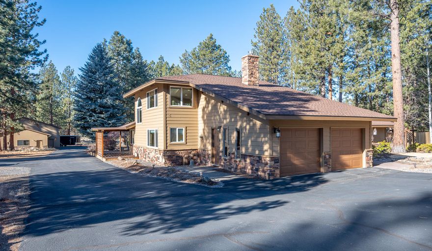 Peaceful & private Woodside Ranch! Backing directly to DesChutes Nat'l Forest & minutes to downtown Bend, this updated 4 bed/3 bath/3 living spaces traditional northwest home on 2.26 acres is a private gem.  The huge heated shop with four bays & office is a perfect place to work from home. The house features gorgeous oversized windows/skylights, vaulted ceiling, English Pub engineered hardwood flooring, three fireplaces, beverage bar, wine cooler/pantry, & is wired for surround sound.  The kitchen has slab granite counters, stainless steel appliances, LED under-mount & recessed lighting. Spacious master suite has two walk-in closets and overlooks the private courtyard & pond. Open loft (464 sf) upstairs with built-in side by side work stations. Landscaped, wrap around deck, hot tub, paved driveway, RV storage/parking, AND MORE.  Home warranty included. Listing agent is owner and licensed broker in Oregon and is a principal in the transaction. Offer deadline is Tuesday, Feb. 2, 4:00 pm.