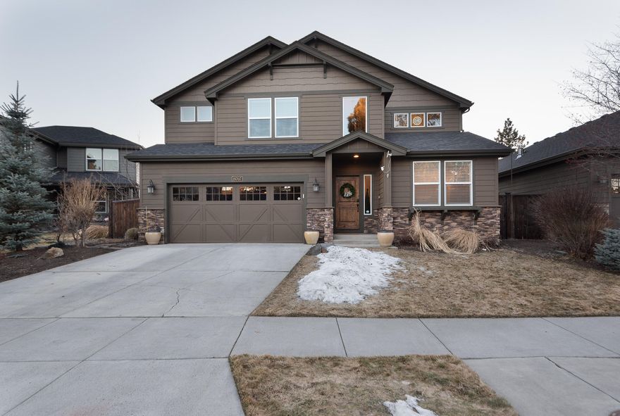Enjoy a high quality of life in this stunning Aspen Rim home. Just across the street from neighborhood common area and a stone's throw from the community pool, playground and pavilion, this 3,051 sf home is situated on .15 of an acre. Light and bright with features that include an open floor plan, master and den on the main and 3 bedrooms, junior suite plus an open bonus loft upstairs for a total of 5 bedrooms, office and 3.5 bathrooms. Interior features include a beautifully updated kitchen with custom cabinetry, hardwood flooring, vaulted ceilings, gas fireplace, A/C and many other sophisticated touches. The backyard has been designed for entertaining with amenities that include a covered patio with outdoor theater, large outdoor grill/kitchen, firepit area and outdoor hot tub. This is a must-see home in a very desirable SW Bend location close to schools, river access, shopping, bike paths.
