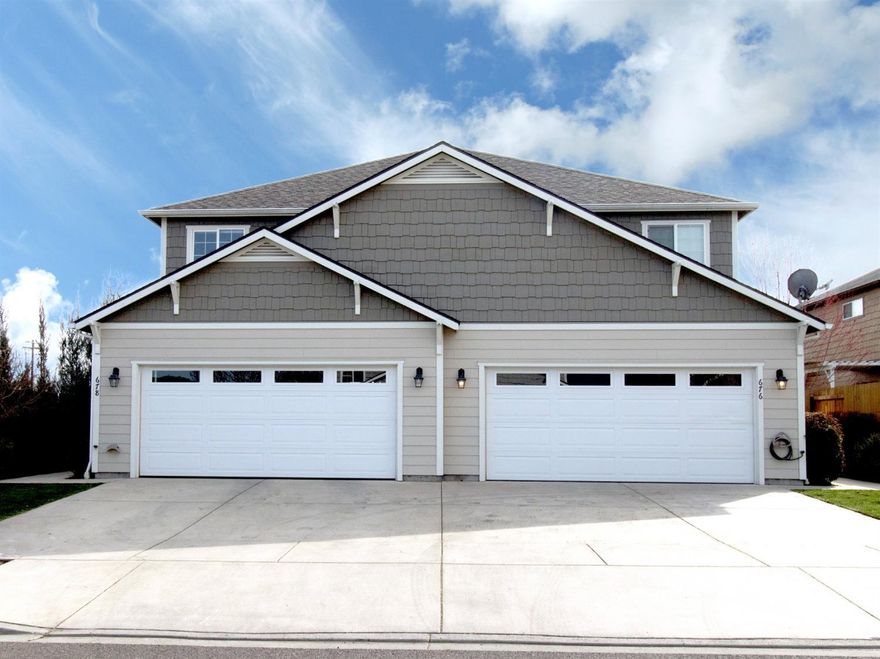 This Turn key and ready to move-in home is composed of quality upgrades including a wall mounted fireplace, granite counter tops with custom eucalyptus wood cabinetry, Stainless steel appliances and beautiful new laminate flooring downstairs!!! Spacious Bedrooms upstairs with laundry room on main level and 2-car garage. Park like mature landscaping in front AND back yard with beautiful cedar deck. Amazing covered dog kennel located within fenced enclosure. Spacious backyard also includes flagstone, horseshoe pits and a play structure. This is a must tour home!!!