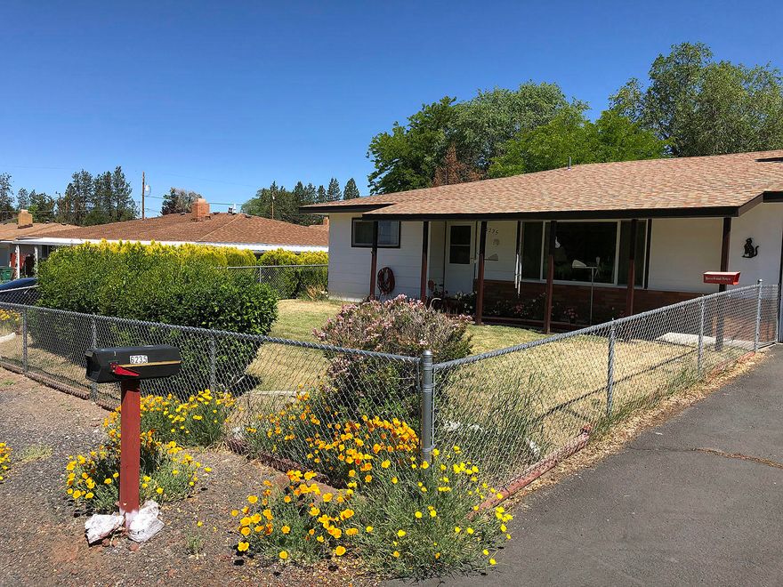 Come see this well-maintained home with privacy fenced backyard. Listen to the birds sing in the 2 apple trees on the back deck. Front yard is fenced as well. 3 bedroom/ 2 full bath home with utility room and 1 car garage. There is a carport next to the garage. As is seller is unable to make repairs.