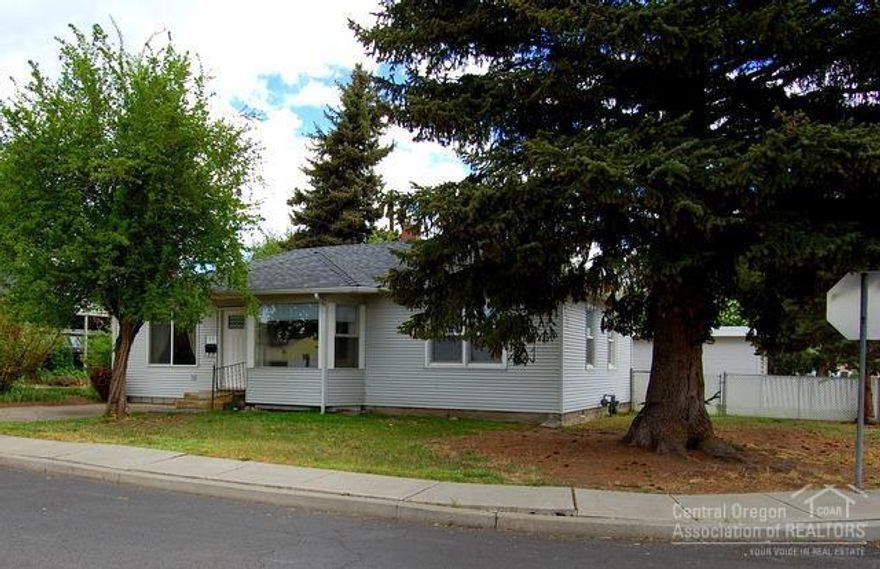 Great location! Single level, 2bd, 1ba, 1035sf home on Deer Street. Corner lot with fenced back yard and ample room for a garden. Open floor plan with large utility and pantry. Area for wood stove in living room or your choice of alternate heat source. Storage shed, detached garage with shop area. Property has underground sprinkler system and irrigation well.