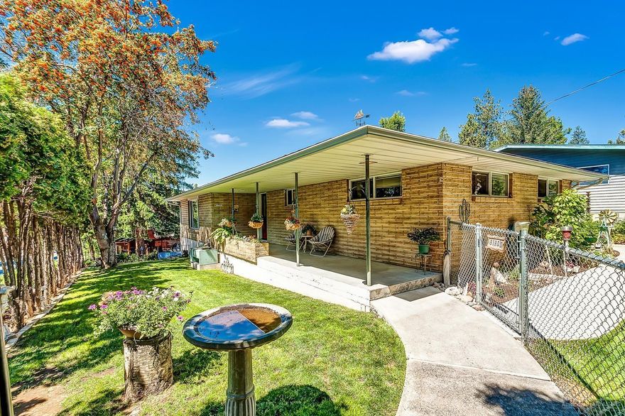 Mid-town corner lot, 1953 mid-century modern brick home with finished basement/family room with separate entry. Radiant floor heat throughout entire home, plus F/A heat and AC (heat pump) Updated kitchen with granite and 6 burner Viking stove. RV parking with complete hookups. Comfortable outdoor space off dining room, roof replaced in 2008, shop behind single car garage even has heat and A/C, outdoor water faucets are both hot and cold! So many options with this home. Buyer to do due diligence.