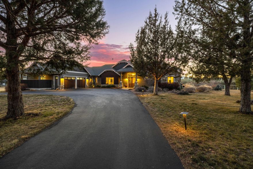 This stunning custom-built home in the desirable Tumalo area of Bend offers breathtaking mountain views and exceptional craftsmanship. The single-level floor plan features vaulted ceilings, wood beams, and a two-way wood-burning fireplace. A gourmet kitchen with black granite countertops, stainless steel appliances, and a marble island is perfect for gourmet chefs. The serene primary suite on N. end of the home includes a gas fireplace, vaulted ceilings, & French doors leading to a covered patio and a hot tub. The primary bath has a steam shower, soaker tub and walk-in closet.Two additional bedrooms on the S. end share a bathroom w/ a double vanity and roll-in shower. A detached ''Vacation Cabin'' offers views, wood-burning stove, kitchenette, & full bath. Set on 5 acres with 4.40 acres irrigation rights, a pond, & greenhouse, the property provides privacy and tranquility. Outdoor enthusiasts will enjoy hiking, biking, & riding horses nearby, while Bend + Sisters are just 15 minutes a