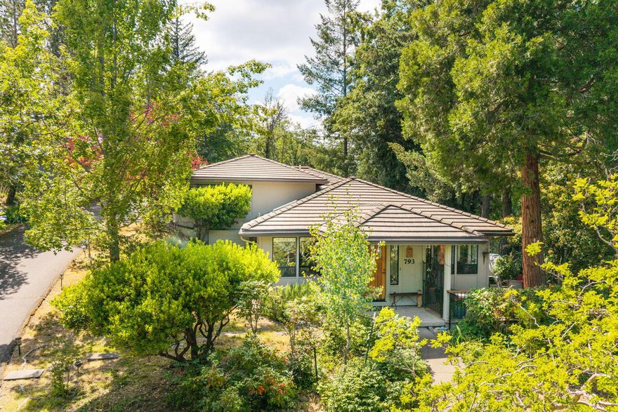 Custom quality-built home with a wonderful, serene setting above the University in beautiful Ashland Oregon. Main house has 3 bedrooms, 2 bathrooms, approx. 1888 SF, and was built in 1988. Well-designed floor plan w/ cozy spaces, built-ins and creative architectural features throughout make for a special home that takes advantage of its setting within the quaint Quailhaven neighborhood, where nature abounds. Private foyer leads to the main living area w/ kitchen, breakfast nook on one side and dining, living room w/ gas fireplace and access to the side yard patio and front deck sitting areas on the other. There is a detached studio/ office space, approx. 500 SF, built in 1997. Vaulted ceiling, full bathroom, separate heating/cooling system and spacious storage room underneath. Back and side areas are fenced in, plenty of sitting areas for your outdoor enjoyment. Mature landscape, tall trees and open space on two sides create a wonderful sense of privacy. Ready for you to enjoy!