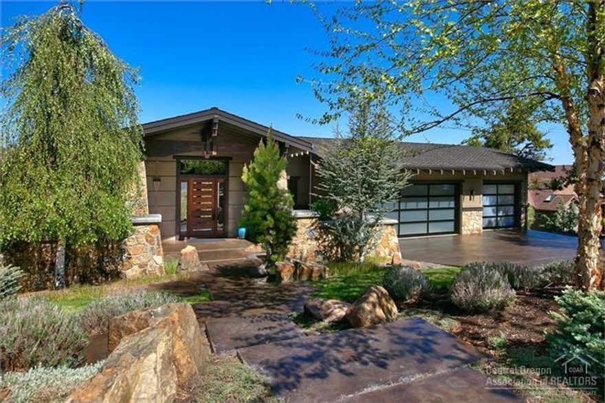 Few homes capture the essence of Central Oregon quite like this home. Wake to sunlit snow covered peaks and relax w/ amazing sunsets. The 1.5 acre lot ensures privacy at one of Bend's most prestigious addresses.The home features Cumanu wood floors, zebra wood custom cabinetry, 3 fireplaces& a luxurious master suite w/ fireplace&heated limestone bathroom floors. The expansive backyard with Cascade mountains glistening inches away lets you breathe in the sights&sounds,one of the most beautiful scenes in Bend.