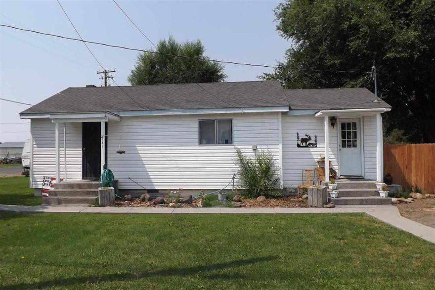 Peaceful Small Town Setting! Well Kept 3 Bedroom 1 Bath Home With Easy Care Vinyl Siding, 4 X 6 Cellar, New 20 X 20 Deck, Beautiful Privately Fenced Back Yard.
