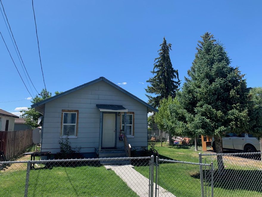 Cute little one bedroom one bathroom house in the small town of Tulelake. The house features laminate floors, nice sized bedroom and bathroom, inviting living space, kitchen complete with a dishwasher and an oversized utility room. The property has fencing, two metal sheds and a covered carport. (The larger shed belongs to the tenant and is not included.)