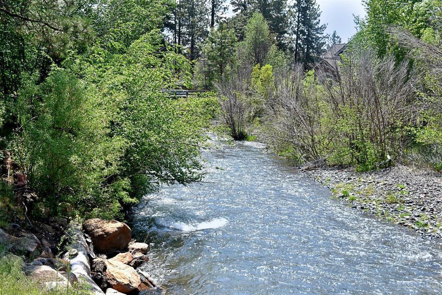 Waterfront! One of the very best creek front lot on the market. Over 1/4 acre with wide open view of the creek both upstream and down. Beautiful newer homes next door. City water and sewer, and power available. Easy to build. Great close to town location.