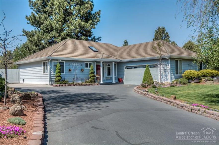 Oh My Gosh (OMG)! Completely remodeled single level home as follows: Hardwood floors,tiled bathrooms, tiled shower, lighting including ceiling fans, custom window coverings, new cabinet hardware, and baseboards. This home also has a tiled roof! All situated on a very private .47 acres within the heart of Bend.The back yard is perfect for gatherings of any size, and has incredible landscaping with green house and shed. This home is stunning, and won't last long.