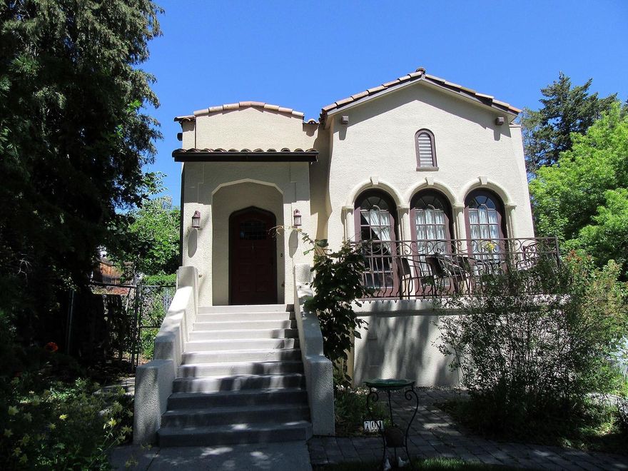 Charm and elegance describe this circa 1920's Mediterenian style stucco home with 2,700 sq.ft of living area and many updates. Including new windows, new paint, geo well pipes redone. New front steps, new front balcony with iron railing, new back patio designed to drain away from home. Featuring 4 bedrooms, 2 baths, TV/sunroom, large family room, plus office area. Large utility room with sink, gorgeous wood and tile floors, great kitchen with pantry. Fenced back yard with mature landscaping and green house, on nice corner lot jus down from Roosevelt school.Some furnishing are negotiable. Seller has plans for a carport he will leave.