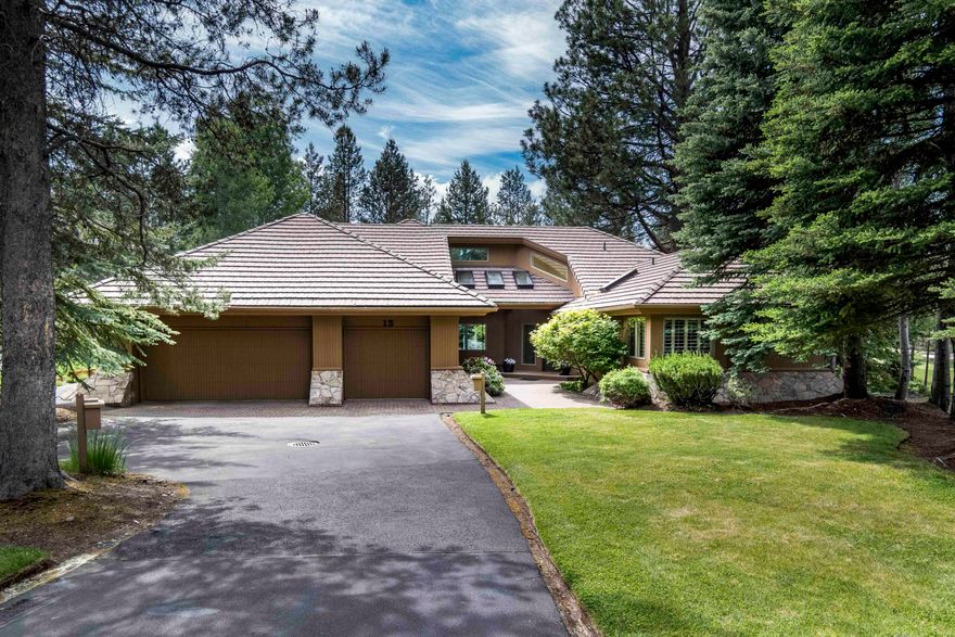 Welcome to luxury living on the 13th Tee of the Woodlands Golf Course in Sunriver! This exquisite single-level home boasts a separate guest wing, large office with cedar accents, and custom-built cabinets throughout, all showcasing builder Steve Madsen's quality and craftsmanship. The 0.37-acre lot is beautifully landscaped and features 154 feet of golf frontage, providing stunning views from the large deck, complete with a covered area for year-round enjoyment. The oversized 2.5 car garage offers a heated storage area, and the tile roof and paver entry add to the home's curb appeal. Dual zone heat & A/C ensures comfort in every room, while 4-inch plantation shutters create a luxurious atmosphere. The dining room and breakfast nook are perfect for entertaining guests, and the wet bar with wine refrigerator is a great place to unwind after a long day. Relax in the spacious primary suite. Don't miss your chance to own this exceptional property! SHARC Paid.