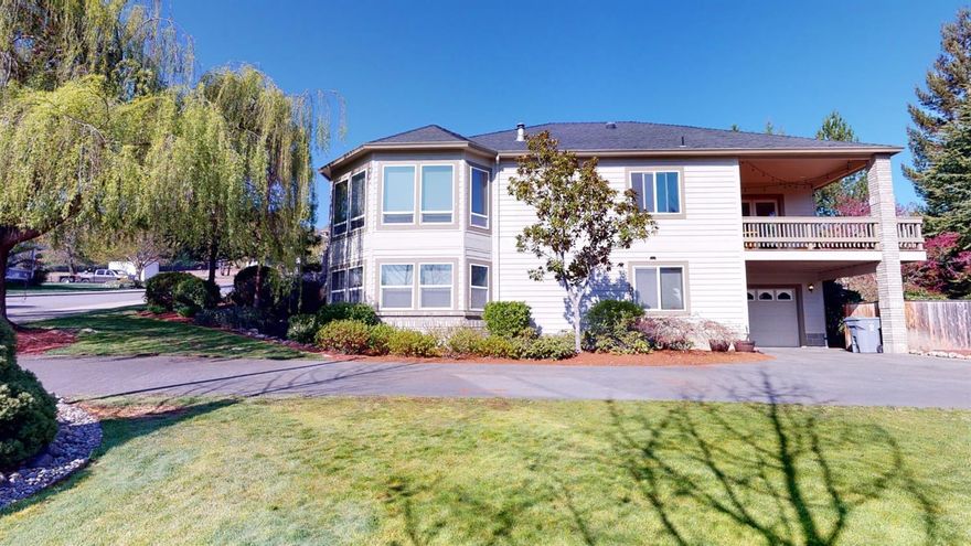 Motivated Sellers!! Priced to Sell!! Beautiful  Custom Built home located in NW Grants Pass. Home is very grand, with 10 foot ceilings, multiple windows that offer great views of city lights and lets the natural light in. Magnificent master en suite which includes a large walk in closet, seating room that is currently being used as an office or den and a sun room\spa room. Large kitchen with granite counter tops, new double oven, gas cook top, stainless steel appliances and a great view from the sink window. Round seating room with gas fireplace and walls of window. The lower level would be great for separate living quarters, a 2nd en suite, with a private entrance and one car garage. Hobby room is extra-large with cabinets and lots of storage. Both garages have tiled floors and fenced in 45' foot RV parking with 50 AMP hookups. Park like landscaping, plenty of parking for all your toys. All information is deemed reliable, and not verified.