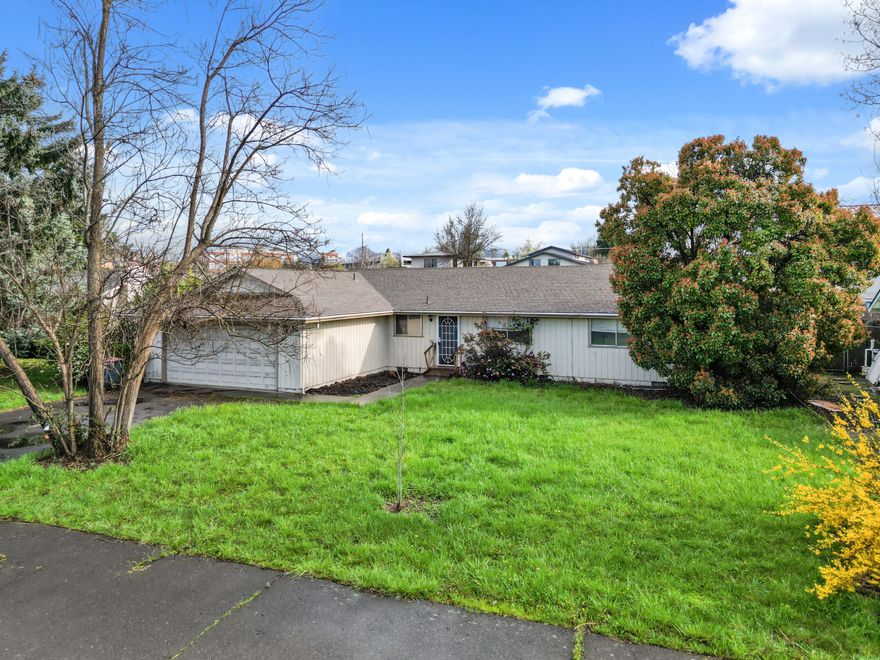 Tucked on a massive oversized lot, this turnkey 3-bedroom, 2.5-bath home is ready for its next owners! Featuring an open-concept layout with bright and inviting living spaces, this home offers both comfort and functionality. Conveniently located just minutes from all shopping centers, restaurants, and more, you'll have everything you need right at your doorstep. The expansive outdoor space provides endless possibilities for gardening, entertaining, a potential pool, shop/adu, or future expansion. Don't miss this sweet opportunity!