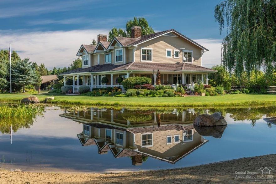 The McGinnis Ranch is located west of Bend, Tumalo area. With 77.75+- acres of farmland and horse pastures Spectacular Cascade Mountain Range views. The ranch has won numerous awards including Bend's outstanding Design Award and is a 2 time winner of the Central Oregon Master Garden Tour. Property features a custom-designed 4,500+-sqft farmhouse with attached 3 car garage and a managers home and additional guest quarters.The ranch is ideal for a Equestrian Center and represents the Best of CO