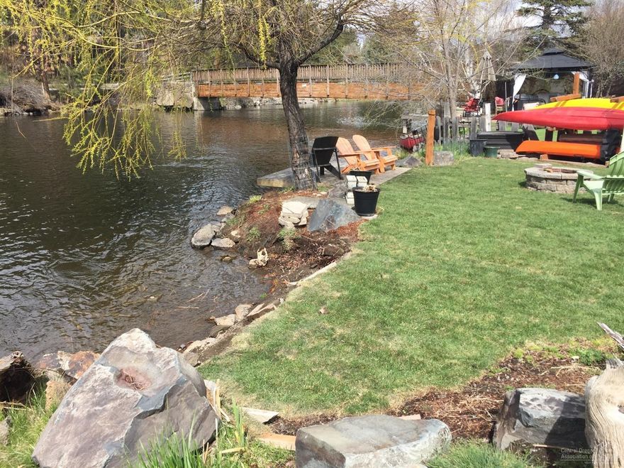 Rare opportunity to purchase one of the best downtown river front lots in Bend. Right between Miller Landing Park and Columbia Park. Approved Vacation Rental Land Use Permit in place, transferable. Approved dock. Built in 1918, the house is in varying degrees of remodel and updating. House is being sold as-is Buyer to do own due diligence.