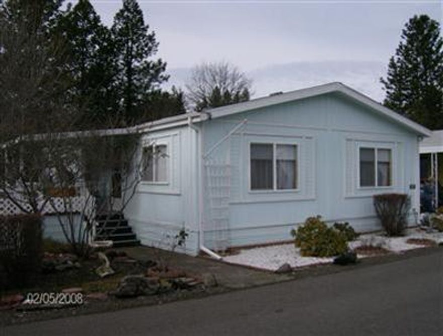 Custom home with lots of extra touches.Plenty of storage. Very spacious kitchen, nice laundry room. Tape & textured walls, walk in closet, extra custom cabinets.Eating bar off kitchen with large dining area.Lots of windows w/new blinds, new laminate floor in kitchen,matching lino in large utility room.Home has been recently painted on the exterior.Large storage/shop 10x16 shed,custom make w/cabinets and shelves.Home Warranty Included.