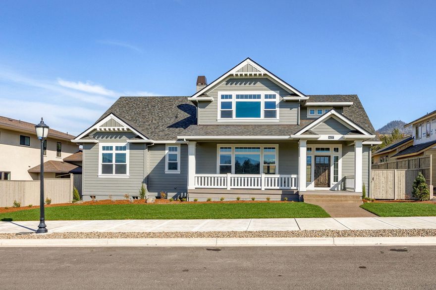 Brand new, one-of-a-kind, craftsman style home in Summerfield!  Beautiful views from most of the rooms in this custom designed home.  Large, white painted, island kitchen with Kitchen-Aid appliances, double ovens, and a large walk-in pantry.  The primary suite is on the main level and has a luxurious bathroom with double vanity, free standing soaking tub, walk-in shower, and spacious master closet.  There are four bedrooms and 3 full baths.  One of the bedrooms is ideal for an office and is on the main level.  There are two bedrooms and a bonus room upstairs.  Gorgeous hardwood floors in all the main living areas.  Quartz counters throughout.  Tile showers and floors in the bathrooms and laundry. There is a wonderful, covered front porch to take in the views.  The fully landscaped and fenced backyard also has a nice covered patio.  The three car garage is in the rear of the house.  Earth Advantage Certified.  The listing agent is related to the seller.