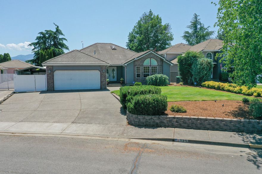 This Central Point home has it all! 1887 sq.ft. of living space with three bedrooms and two full bathrooms. Inground pool and RV parking! As you enter this home, you will notice the hardwood floors and great floor plan. The living room has a gas fireplace perfect for the ambiance and chilly evenings. The kitchen has Corian counters and plenty of countertop space. There is a separate dining area as well. The primary bedroom, located at the back of the home, has a walk in closet, vaulted ceilings, beautiful soaking tub and separate shower. Outside you will find an inground pool, hot tub covered by a red wood gazebo, outdoor kitchen, water feature and small garden.   This is a beautiful home.