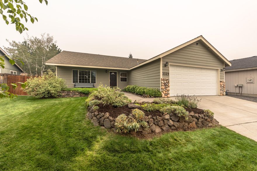 This well-kept 3-bedroom, 2-bathroom single-level home is ideally located in NE Bend on a quiet street, just minutes from shopping, restaurants, coffee shops, and St. Charles Hospital. Enjoy a functional open floor plan perfect for hosting dinner parties or cozy nights in. The primary suite offers a walk-in closet and a comfortable retreat after a long day. Outside, the beautifully landscaped yard provides a peaceful setting, and the attached 2-car garage adds convenience. Only 1 mile to On-Tap and close to medical facilities, this home is a perfect choice for first-time buyers, downsizers, or as an investment property.