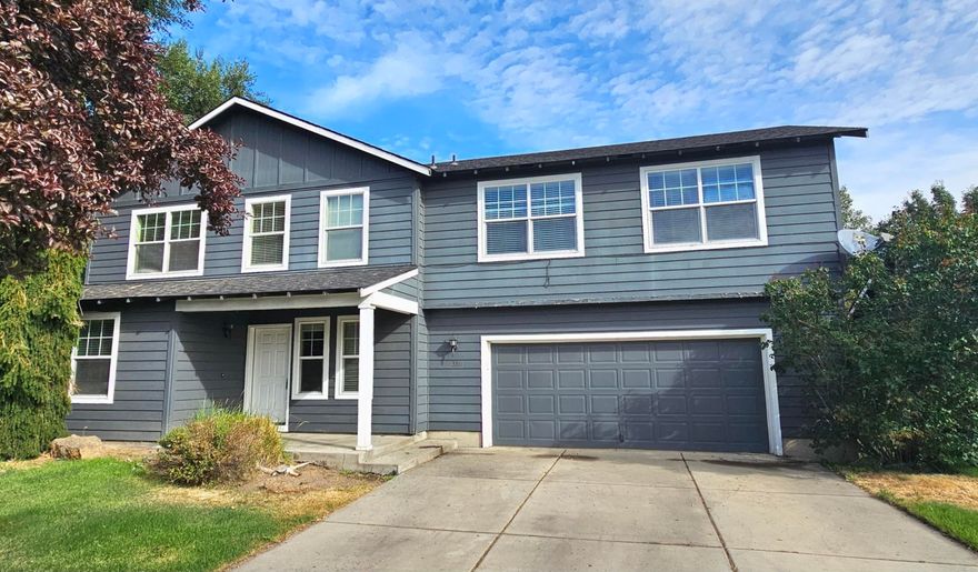 Tucked within the Willow Springs neighborhood of SW Redmond, this inviting home is close to Coffee Depot, Dry Canyon Trail, and downtown Redmond, with the new community recreation center opening early 2026 just minutes away and easy access to Highways 97 and 126. Welcome home to this 4-bed, 2.5-bath residence offering 2,022 sq ft of comfortable living space. The kitchen features all new appliances including a gas range and flows into the dining and living areas, where a centrally positioned gas fireplace adds warmth and character to the open yet defined main-level layout. Upstairs, a private bonus room located between two bedrooms provides flexible space for work, media, or play. Outside, enjoy a spacious and private backyard with mature trees, a plum tree, a fully automatic sprinkler system, and space for gardening or outdoor seating. Additional highlights include central air conditioning, an attached 2-car garage, and a tree-lined street in a quiet residential area. New roof soon.