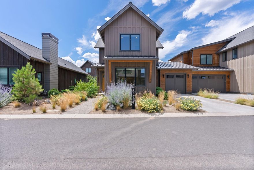 Highlands Ridge was created for discerning buyers seeking affordable luxury in the heart of Bend's premier resort community, Tetherow. This rare Manzanita model offers 1,652 sq ft over two levels with a wide-open floor plan that lives like a detached home, only attached at the garage. The main level features a spacious great room and chef's kitchen with a large island and 6-burner range. Upstairs, two full suites offer comfort and privacy for owners and guests. The west-facing patio is ideal for relaxing, with hookups for a hot tub or fire pit and space for dining or lounging. Located just steps from the new homeowner pool and all of Tetherow's world-class amenities, including trails, dining, fitness, golf, and more. Enjoy luxury, convenience, and recreation in one of Bend's most sought-after communities.