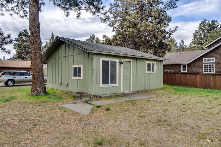 Prime west side location on sunny corner lot. Close to shopping, restaurants, and other west side amenities. Large lot with opportunity to redevelop and/or remodel.