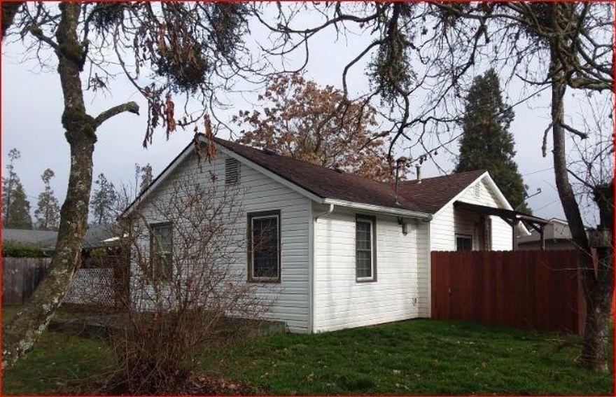 Fantastic combination of size and location!! This is a must tour, updated 1270 sq foot 3 bedroom 1 bath home, with a large fenced in back yard. Over sized kitchen, spacious laundry room, and super adorable front porch. Home has been updated with a new roof in 2011, and vinyl windows. Detached work shop in the fenced in back yard. Room for an RV and garden. Home is turn key.