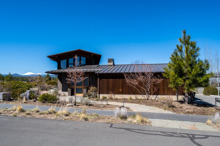 Enjoy all that the Westside of Bend offers from this gorgeous custom home in sought after Shevlin Commons. This custom home has spectacular Cascade Mountain Views! It boasts multiple outdoor living spaces, including the privacy of a fully enclosed courtyard with a hot tub and built in gas firepit. The indoor/outdoor sun room off the master bedroom has glass folding doors that allow you to enjoy a sheltered outdoor experience with a built in gas heater and ceiling fan or keep the glass doors closed yet feel like you are outside. The home has exceptional custom built in cabinetry throughout, including a murphy bed in the office, amazing pantry, lovely display areas for your art and special pieces are throughout the home. The master bedroom and office, along with two full bathrooms are on the main floor with two additional bedrooms and a full bathroom upstairs. Solar panels on the roof help keep energy costs low. Take advantage of the NW Bend Lifestyle just out your front door!
