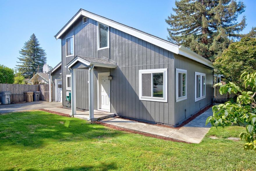 Beautifully updated home in District 7! This 3 bedroom/2 bath home features a spacious living room with vaulted ceiling, 1 bedroom and bathroom on the main floor, master suite and second bedroom on the second floor AND a gorgeous back yard with new covered deck, ceiling fan, pool and hot tub - what a great way to expand your living space and enjoy beautiful Southern Oregon! New flooring in the living room, kitchen and bathroom, new vinyl windows downstairs and new paint inside and out. Don't let this one get away!