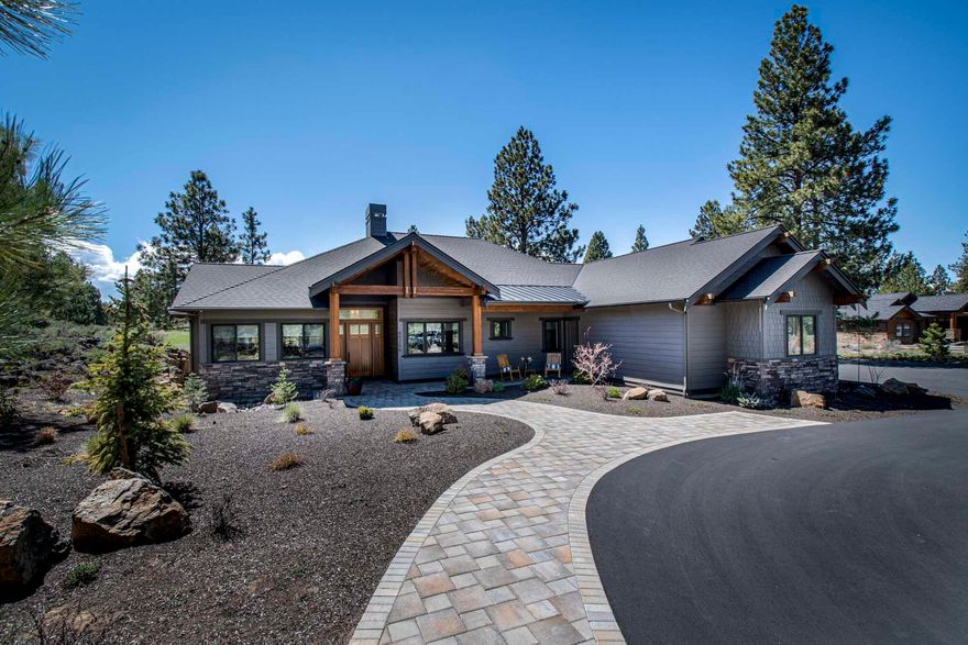 Beautiful Custom Mountain Modern style home on Lost Tracks Golf Course. Enjoy life in this gated community with large estate sized lots. Single level living with a zero-step entry & thoughtful layout for accessibility & enjoyment for all while enjoying the golf course views & Central Oregon terrain from nearly everywhere. This lovely home, built by Spring River Builders in 2019, is immaculate offering on-trend conveniences & high-end finishes throughout. The great room soars w/ open beam ceilings & huge windows. Thoughtful accents & industrial category lighting surround you w/ sturdy but lovely style & the stacked-stone gas fireplace grounds the entire space. Having said all that- there is an intimate feel here, yet it lives large w/ 4 bedroom suites plus a den & plenty of outdoor space to enjoy! Covered paver patio lets you take the party outside. Zoned heating/cooling & 3– car garage. From this premier gated community, it's mere minutes to all the activities & events!