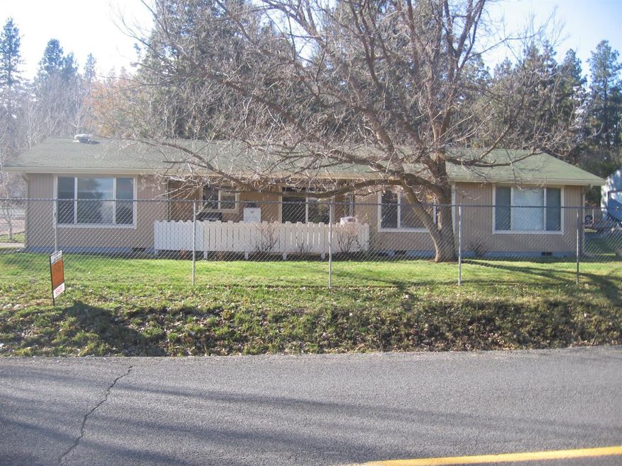 Looking for a nice home plus a shop ? This is it ! 3 bed 2 bath home in Klamath River Acres on .61 of an acre. This Home offers 1843 SQ. FT. With family room and living room, Kitchen and formal dining room. Kitchen has white cabinets, new countertops, and new lighting. Other updates include : New vent fan over stove, New carpet, new vinyl in main bath. Master bedroom is a nice size and the master bath remodel is gorgeous Custom built vanity, claw foot tub, beautiful tile. Outside has so much to offer too! Fully fenced 6 ft fencing, great garden spot, custom built chicken coop, green house, and 2 additional sheds. THEN 30*36 shop with 220, storage upstairs, built in shelving and work benches. Private Klamath River Access with Boat ramp, Shop is insulated , home has gutters all around. Must see !